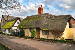 A traditional thatched cottage facing onto the street